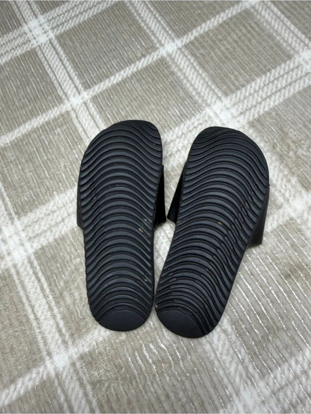 Nike Black Slides with White Swoosh Logo